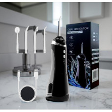 Портативный ирригатор A6s с аккумулятором, USB зарядкой и четырьмя сменными насадками для чистки зубов